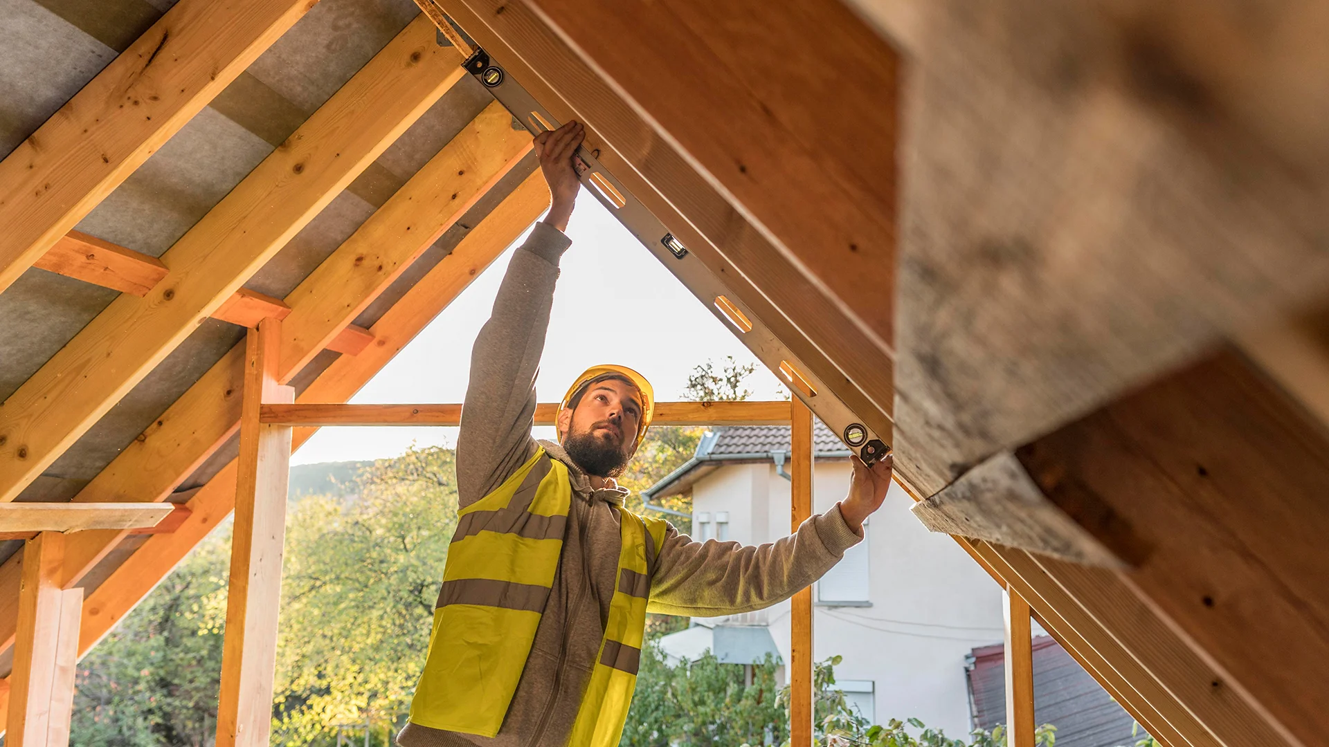 Carpenter man working on a roof